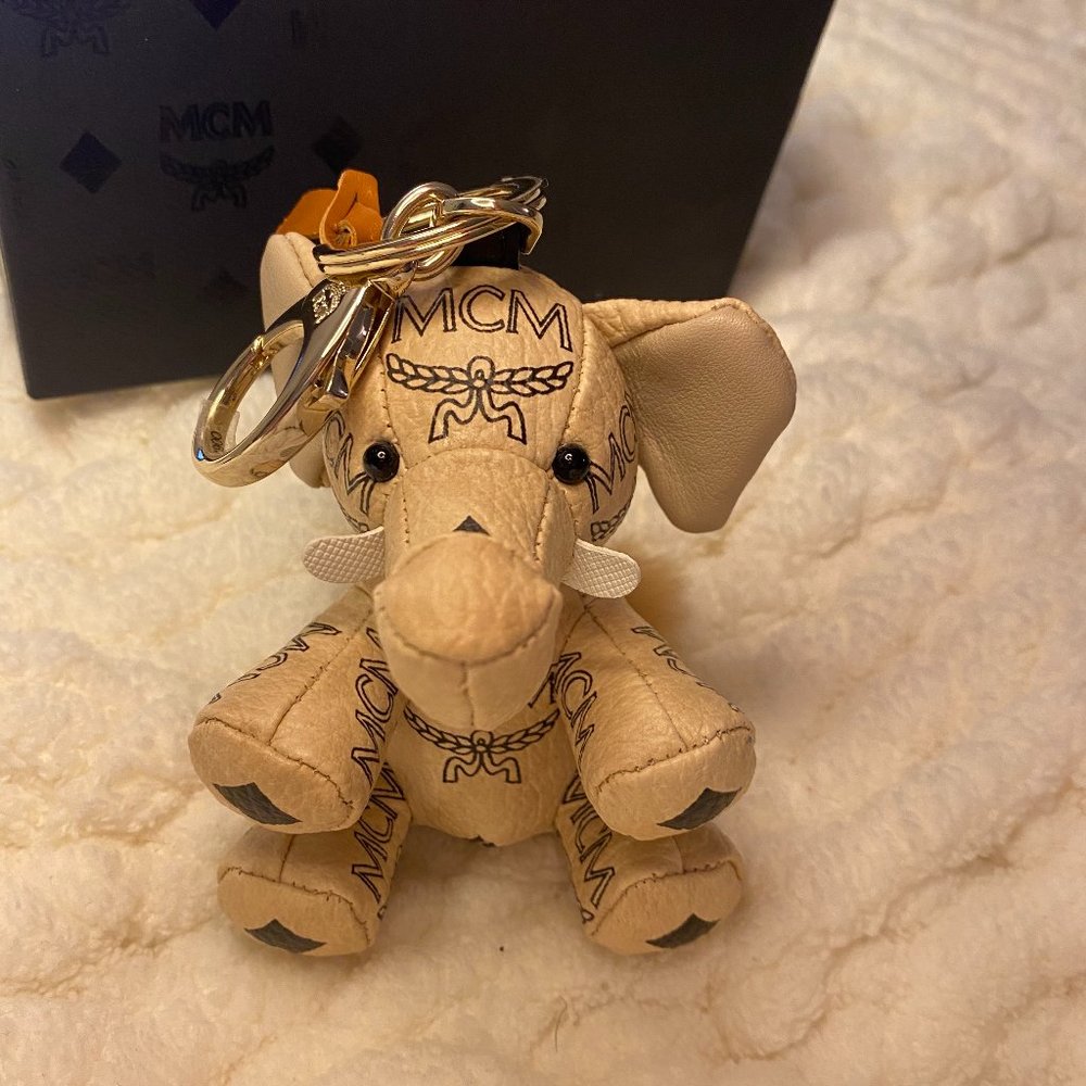 MCM beige bag elephant charm with dust bag and original tags